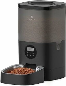 Automatic pet feeder with digital display and food tray.